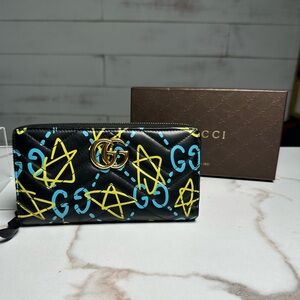 Gucci Black Wallet with Vibrant Yellow and Blue Accents